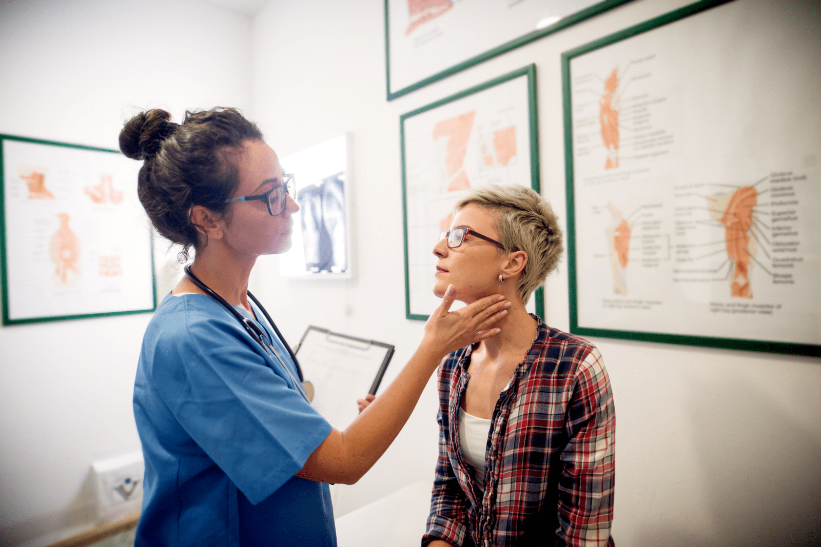 Nurse checking patients pulse